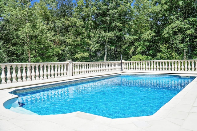 outdoor pool with fence