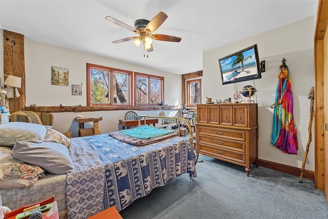 bedroom featuring ceiling fan, baseboards, and carpet