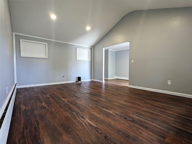 65 Biscayne Dr, Selden, NY 11784 - unfurnished room with lofted ceiling, a baseboard heating unit, dark wood-style flooring, and baseboards