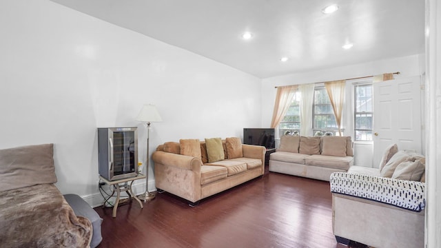 150-31 Hoover Ave, Briarwood, NY 11432 - living room featuring dark wood-type flooring, heating unit, and recessed lighting