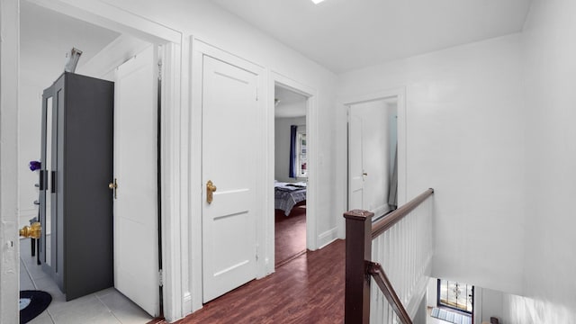 150-31 Hoover Ave, Briarwood, NY 11432 - corridor featuring an upstairs landing and wood finished floors