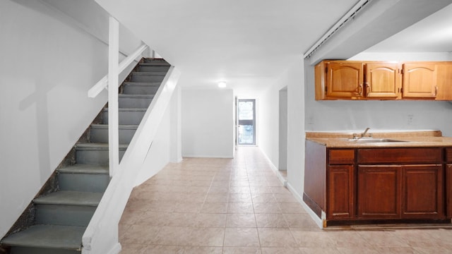 150-31 Hoover Ave, Briarwood, NY 11432 - kitchen featuring light countertops and light tile patterned floors