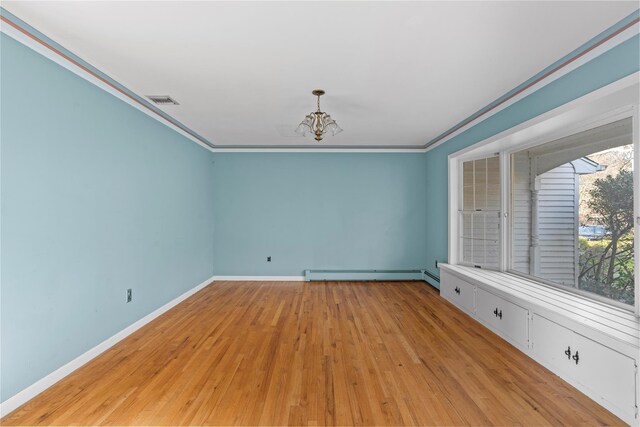 46 Mount Grey Rd, Setauket, NY 11733 - empty room with a chandelier, a baseboard radiator, light wood-style flooring, baseboards, and ornamental molding