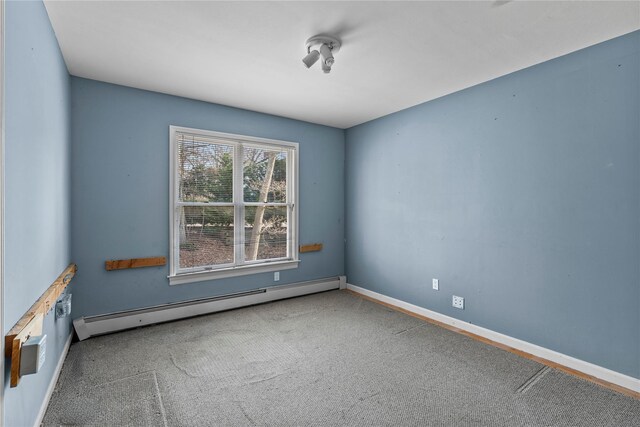 46 Mount Grey Rd, Setauket, NY 11733 - carpeted empty room with a baseboard radiator and baseboards
