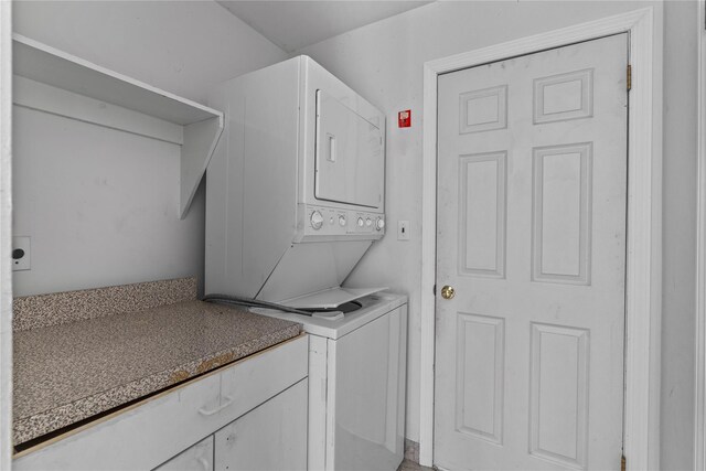 46 Mount Grey Rd, Setauket, NY 11733 - clothes washing area with estacked washer and dryer