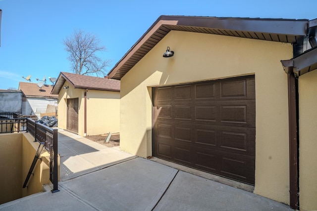 garage with driveway