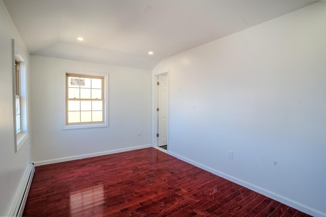 unfurnished room with baseboard heating, baseboards, recessed lighting, lofted ceiling, and wood finished floors