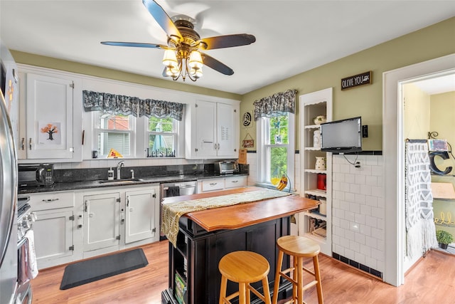 14 Kelly Ct, Kings Park, NY 11754 - kitchen with a sink, white cabinetry, and light wood finished floors