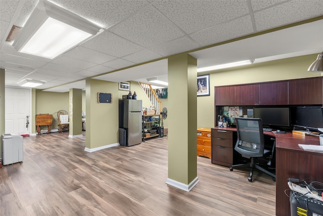 14 Kelly Ct, Kings Park, NY 11754 - office area with a drop ceiling, light wood-style floors, and baseboards