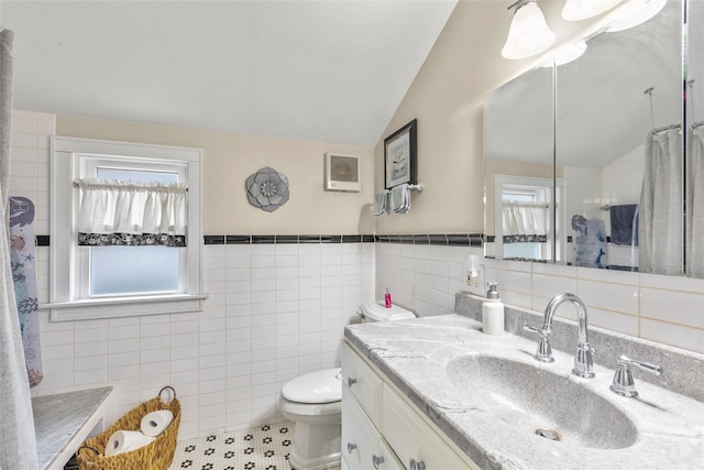 14 Kelly Ct, Kings Park, NY 11754 - bathroom with tile walls, vanity, toilet, lofted ceiling, and curtained shower