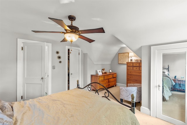 14 Kelly Ct, Kings Park, NY 11754 - carpeted bedroom featuring a ceiling fan, vaulted ceiling, and baseboards