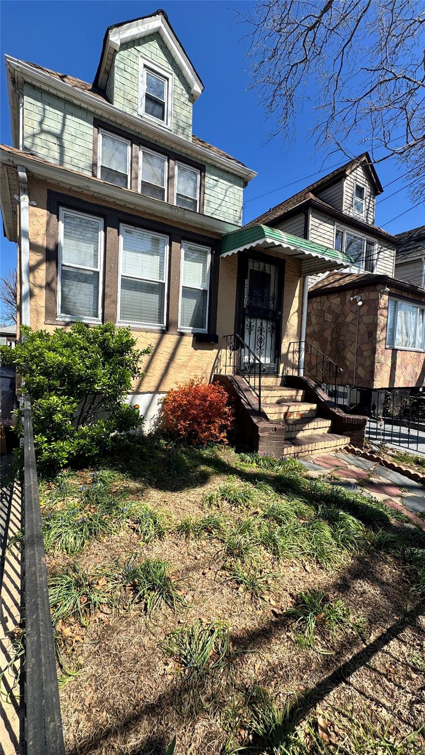 14539 115th Ave, South Ozone Park, NY 11436 - view of front facade featuring fence