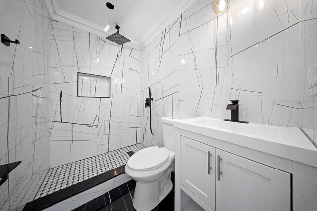 full bath with crown molding, vanity, toilet, a marble finish shower, and tile walls