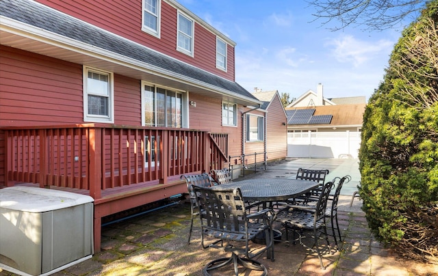 deck with fence, a patio area, and outdoor dining space