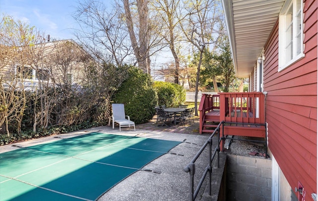 exterior space with fence and a patio