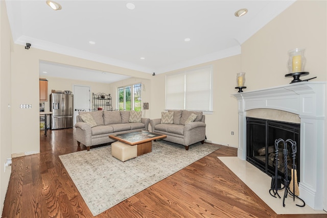 146 Duke Dr, Carmel, NY 10512 - living area featuring a fireplace with flush hearth, ornamental molding, dark wood-style floors, and recessed lighting
