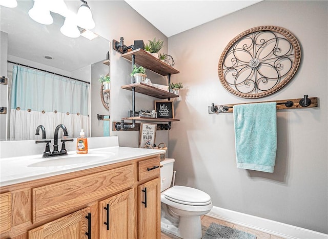 full bath with tile patterned floors, toilet, baseboards, curtained shower, and vanity