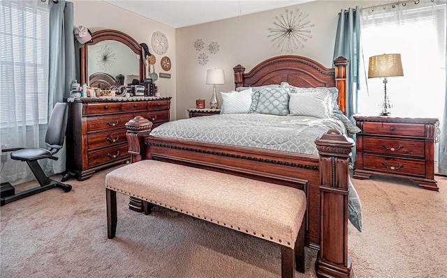 bedroom with light carpet