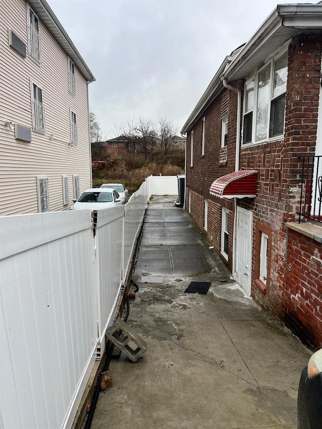 3412 Hunter Ave, Bronx, NY 10475 - view of side of home with fence and brick siding