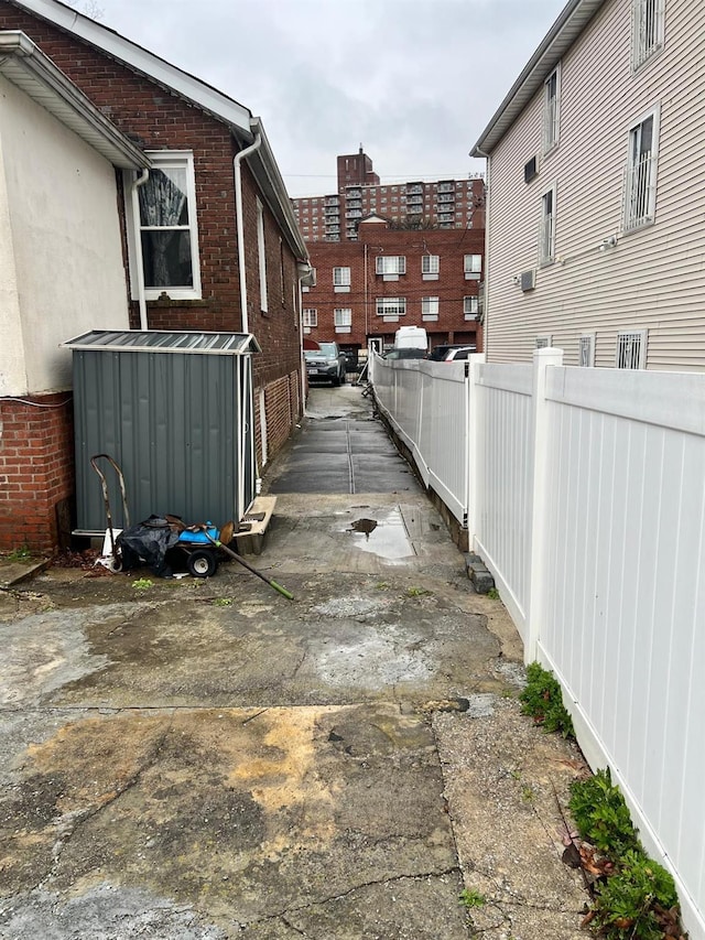 3412 Hunter Ave, Bronx, NY 10475 - view of home's exterior with brick siding and fence