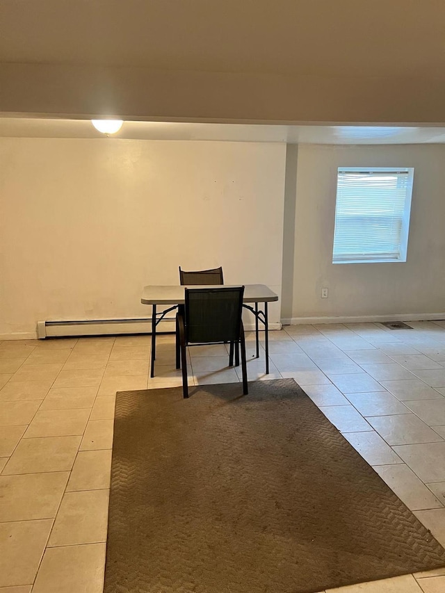3412 Hunter Ave, Bronx, NY 10475 - interior space with a baseboard radiator, light tile patterned flooring, and baseboards