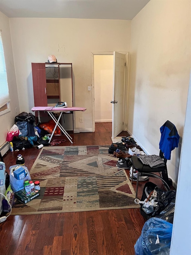 3412 Hunter Ave, Bronx, NY 10475 - bedroom with a baseboard radiator, wood finished floors, and baseboards