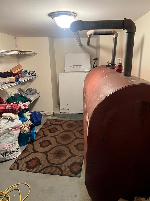 3412 Hunter Ave, Bronx, NY 10475 - room details with washer / clothes dryer, unfinished concrete flooring, and heating fuel