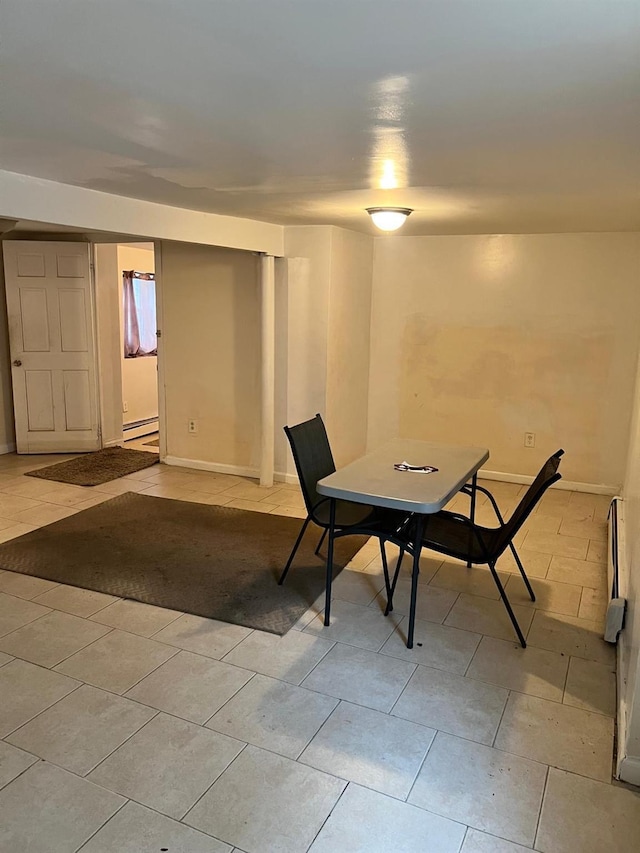 3412 Hunter Ave, Bronx, NY 10475 - dining room featuring light tile patterned floors, baseboard heating, and baseboards