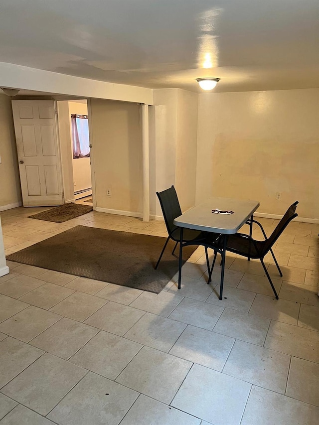 3412 Hunter Ave, Bronx, NY 10475 - dining room with light tile patterned floors, baseboards, and a baseboard heating unit