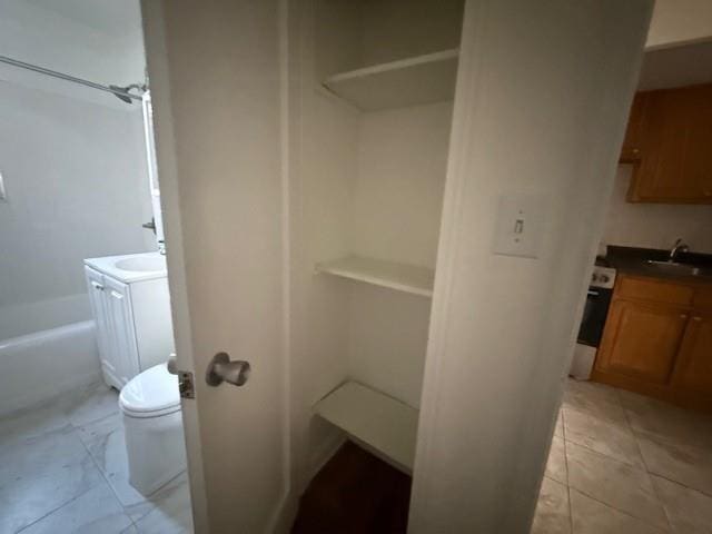 34-15 74th St Unit 4H, Jackson Heights, NY 11372 - closet featuring a sink