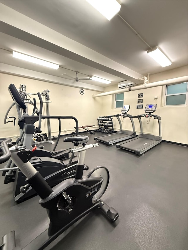 34-15 74th St Unit 4H, Jackson Heights, NY 11372 - gym featuring baseboards and a wall unit AC