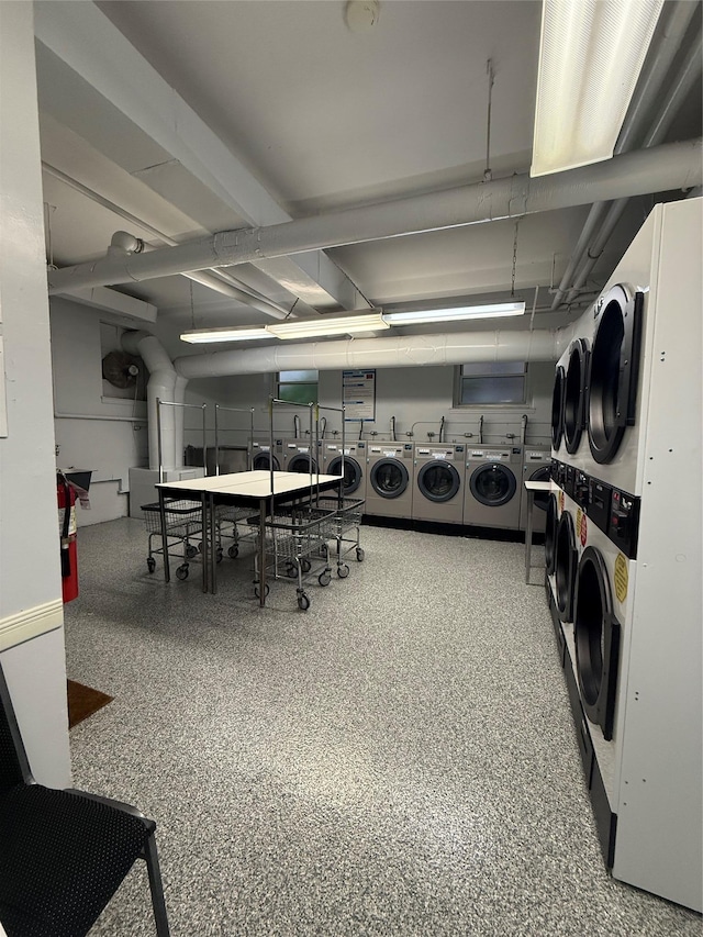34-15 74th St Unit 4H, Jackson Heights, NY 11372 - communal laundry room featuring stacked washing machine and dryer and washing machine and clothes dryer
