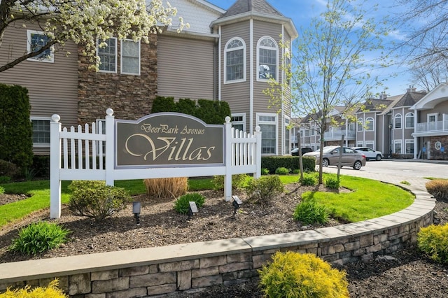 community sign with a residential view