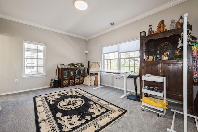 interior space with visible vents, carpet floors, a healthy amount of sunlight, and crown molding