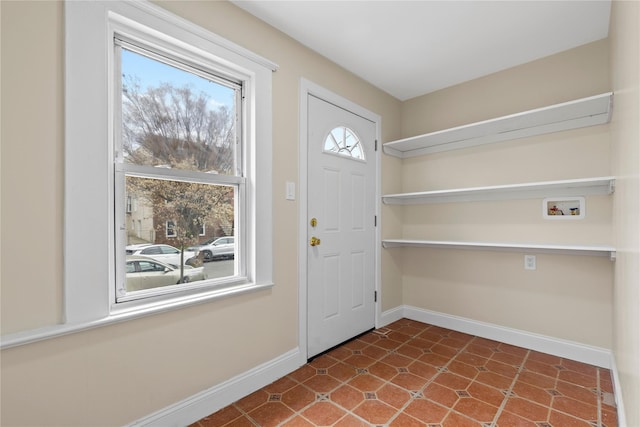 425 Quincy Ave, Bronx, NY 10465 - foyer with baseboards and dark tile patterned floors