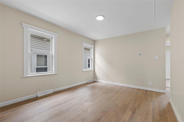 425 Quincy Ave, Bronx, NY 10465 - unfurnished room featuring visible vents, baseboards, and wood finished floors