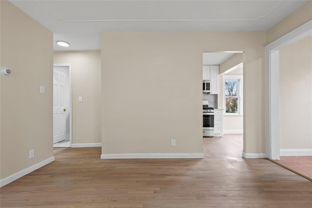 425 Quincy Ave, Bronx, NY 10465 - spare room with baseboards and light wood finished floors