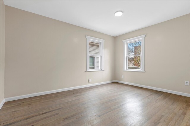 425 Quincy Ave, Bronx, NY 10465 - empty room with baseboards and wood finished floors