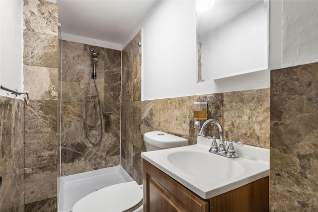 425 Quincy Ave, Bronx, NY 10465 - full bathroom with vanity, tile walls, a tile shower, and toilet