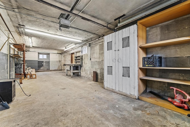 interior space with concrete block wall