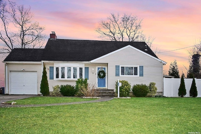 24 Southwood Ln, North Babylon, NY 11703 - single story home with a garage, a chimney, driveway, fence, and a front yard