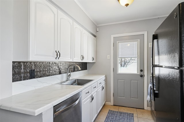 24 Southwood Ln, North Babylon, NY 11703 - kitchen with white cabinets, a sink, freestanding refrigerator, decorative backsplash, and dishwasher