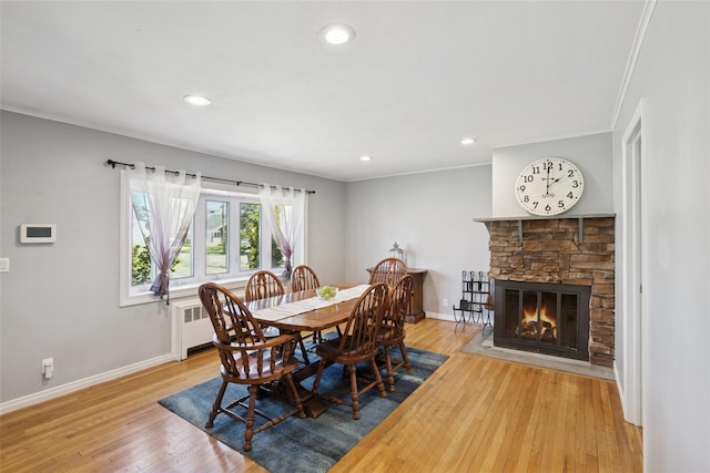 24 Southwood Ln, North Babylon, NY 11703 - dining space featuring recessed lighting, light wood-style flooring, crown molding, and baseboards