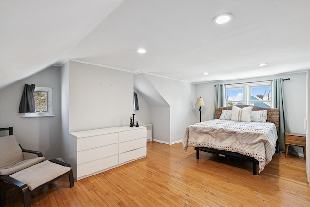 24 Southwood Ln, North Babylon, NY 11703 - bedroom with recessed lighting, light wood-style floors, baseboards, and multiple windows