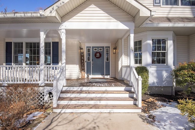 entrance to property with a porch