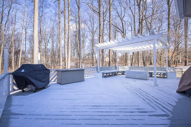 wooden terrace featuring a pergola and grilling area