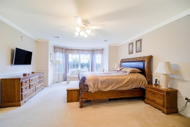 bedroom with visible vents, a ceiling fan, light colored carpet, and ornamental molding
