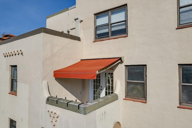 exterior space featuring stucco siding