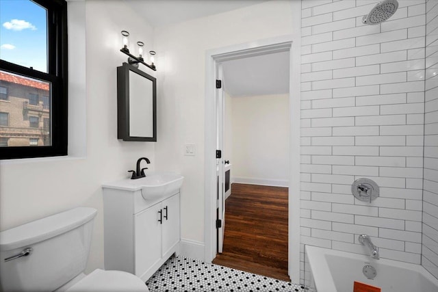 full bath featuring toilet, shower / bath combination, and vanity