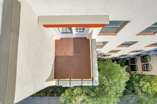 exterior space featuring stucco siding
